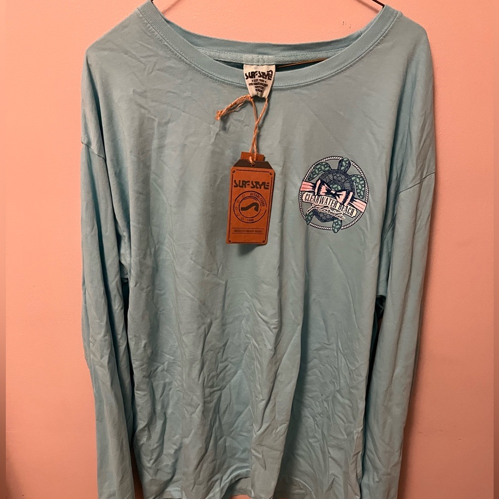 Surf style long sleeve, never worn, some wrinkles, will come out after wash/dry